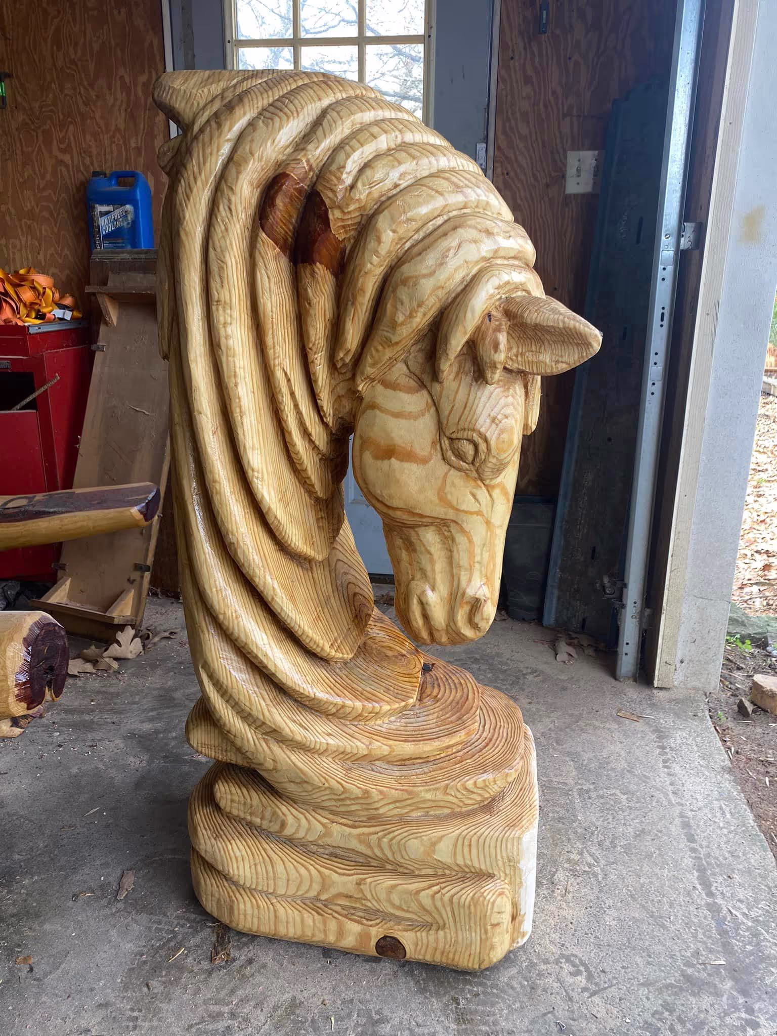 Custom chainsaw wood carving of a horse